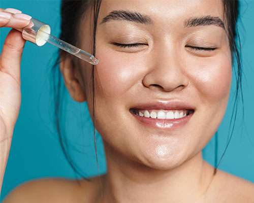 woman applying salicylic acid